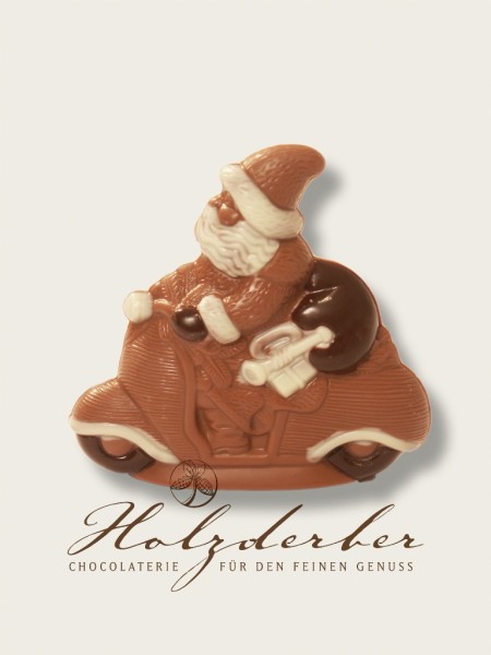 Weihnachtsmann auf Motorrad Edelvollmilch Schokolade handbemalt 11 cm