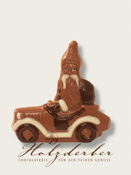 Weihnachtsmann im Auto Edelvollmilch Schokolade handbemalt 15 cm
